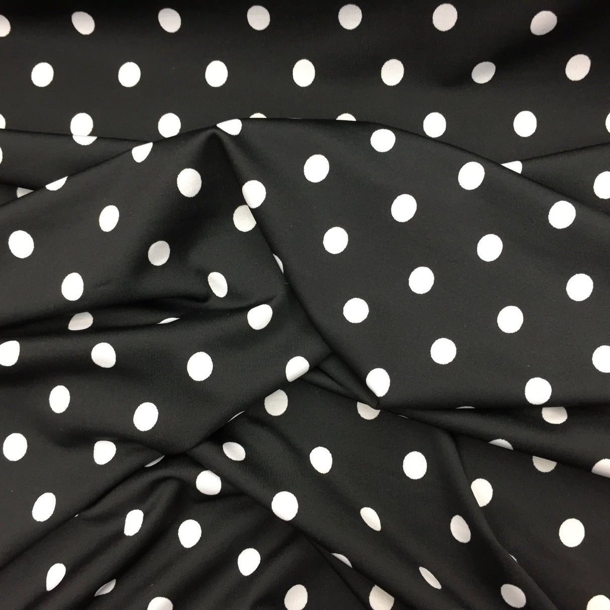 White Polka Dots on Black Spandex Fabric